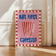 a sign that says but first cafesto on the floor in front of a door