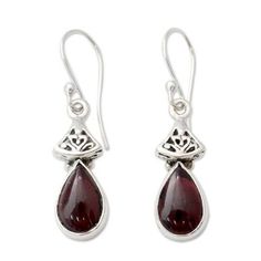 Garnet is dazzling in its crimson splendor. Set in silver the gems grace ornate earrings from Neeru Goel. .925 Sterling silver Elegant Garnet Gemstone Earrings, Elegant Garnet Drop Earrings, Ornate Red Teardrop Jewelry, Garnet Gemstone Earrings Fine Jewelry, Garnet Gemstone Earrings, Elegant Garnet Earrings, Ornate Drop Earrings Gift, Ornate Drop Earrings For Gifts, Silver Sterling Silver Teardrop Earrings