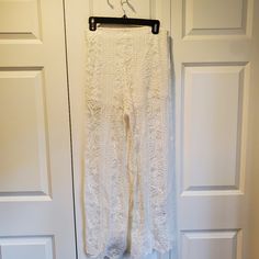 Never Worn. Lined With Shorts. Side Zipper And Hook Closure. Small Stain On Rear Covered By Lace (See Pic). Beautiful Flowy Bohemian Pants. 41.5 Inches Long. Legs Are 13 Inches Wide. Waist Is 27 Inch Circumference. Elegant Lace Bottoms For Vacation, Summer Bottoms With Lace Trim And Non-stretch Fit, Full Length Bottoms With Lace Trim For Spring, Fitted Vacation Bottoms With Lace Trim, Fitted Bottoms With Lace Trim For Vacation, White Bohemian Bottoms With Lace Trim, Non-stretch Lace Pants For Spring, Fitted Lace Trim Bottoms For Vacation, Bohemian White Lace Bottoms