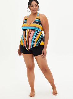 A cute, effortless wireless tankini so you can sun in comfort and style. Matching style(s): Search 10448329 Lightly lined, wireless cups. Modesty padding . V-neck. Adjustable multiway straps. Mesh lining. 30+ UPF sun protection. CONTENT + CARE Nylon/spandex. Wash cold; line dry. Imported plus size swimwear. SIZE + FIT Fits most bust sizes. Please refer to the Size Fit & Guide chart for the perfect fit. The best plus size women's wireless v-neck tankini tops in multi stripe made of nylonspan. You Matches Fashion, Plus Size Swimwear, Tankini Top, Sun Protection, Tankini, Perfect Fit, Mesh, Spandex, Plus Size