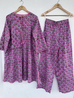 Beautiful Hand Block Print 100% cotton set SIZE CHART IN INCHES SIZE  :  XXS TOP LENGTH : 32 BUST : 32 PAJAMA LENGTH :  40 WAIST : 28 HIP :  42                                                     SIZE  :  XS TOP LENGTH : 32 BUST : 34 PAJAMA LENGTH :  40 WAIST : 30 HIP :  44 SIZE  :  S TOP LENGTH : 32 BUST : 36 PAJAMA LENGTH :  40 WAIST : 32 HIP :  46 SIZE  :  M TOP LENGTH : 32 BUST : 38 PAJAMA LENGTH :  40 WAIST : 34 HIP :  48 SIZE  :  L TOP LENGTH : 32 BUST : 40 PAJAMA LENGTH :  40 WAIST : 36 H Casual Cotton Sets With Printed Motifs, Pink Cotton Sets With Relaxed Fit, Pink Cotton Relaxed Fit Sets, Pink Relaxed Fit Cotton Set, Casual Cotton Pant Set With Floral Print, Relaxed Fit Multicolor Floral Print Sets, Multicolor Floral Print Relaxed Fit Sets, Spring Floral Print Cotton Pant Set, Floral Print Cotton Pant Set With Long Sleeves