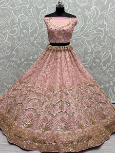 <ul>
<li style="text-align: justify;"><span data-preserver-spaces="true"> Rock ur ethnicity and twril like a princess of the eve wearing pink color delicate fancy cut-dana and sequines embroidered lehenga in net material with fully flair.</span></li>
<li style="text-align: justify;"><span data-preserver-spaces="true">Paired with similar color net material blouse worked with heavy neckline and fancy embroidery with butties also has similar tone net d Formal Party Wear Choli With Zari Work, Formal Party Wear Choli With Resham Embroidery, Formal Choli With Resham Embroidery, Festive Embellished Formal Lehenga, Formal Resham Embroidered Lehenga For Festivals, Formal Resham Embroidery Lehenga For Festivals, Embellished Party Wear Choli For Formal Occasions, Anarkali Style Embellished Lehenga For Formal Occasions, Formal Anarkali Lehenga Embellished