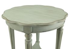 a white wooden table with two legs and a round top on the bottom, in front of a white background