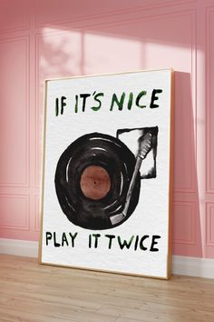 a sign that says if it's nice play it twice on the wall in front of a pink room