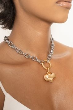 Materials 18k Gold Plated and Rhodium Plated, Steel, Brass Length 15" with a 5" chain extender Closure Lobster Clasp Silver Double Heart Tarnish Resistant Jewelry, Silver Tarnish Resistant Double Heart Jewelry, Silver Tarnish-resistant Double Heart Jewelry, Gold Plated Silver Jewelry With Heart Charm, Valentine's Day Jewelry With Adjustable Link Chain, Valentine's Day Link Jewelry With Adjustable Chain, Heart-shaped Metal Chain Necklace For Anniversary, Heart Pendant Metal Jewelry Tarnish Resistant, Adjustable Metal Chain Necklace For Anniversary