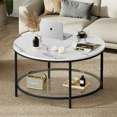 Dextrus modern faux marble round coffee table with tempered glass storage shelf. Featuring gorgeous black U-shaped feet, white marble-like top and crystal clear tempered glass, this contemporary coffee table takes on a luxurious and elegant tune. The 2-tier open coffee table gives you enough space to make daily items organized, ideal for living room, study, bedroom, etc. This round coffee table adds harmony to any style of home decor and is a matching companion to your home decor. Size: 31.5" x Circle Coffee Table, Coffee Table Marble, Marble Round Coffee Table, Table Marble, Table With Storage, Cocktail Table, Storage Shelf, Round Coffee Table, White Marble