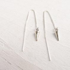 These delicate, but edgy earrings feature sterling silver threads which dangle in the front and back when worn. They have sterling silver spikes on the ends. . { s h i p p i n g } . Other threader style earrings: https://www.etsy.com/shop/CamileeDesigns/search?search_query=threader . { p a c k a g i n g } . Your jewelry will arrive in a cute box - perfect for giving or keeping for yourself. . { s h i p p i n g } . Handmade in my studio and shipped via USPS mail with tracking. Please see shipping Spike Jewelry, Spiked Jewelry, Ear Threader, Silver Threader Earrings, Edgy Earrings, Thread Earrings, Cute Box, Threader Earrings, Gift For Friend