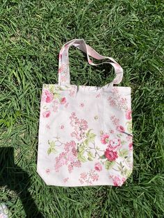 "Teflon waterproof handbags‼ ️ Pink roses flowers print. With inner pocket. Without zipper. Washable. Made of waterproof Turkish teflon fabric. Size: 37 x 38 cm - 15 x 15 inches Ready to ship One of a kind This is a fabric with Teflon impregnation. This gives it a number of advantages, among which the most important are: ❤️ Water repellent! A drop of liquid simply rolls over the surface of the tablecloth, protecting the table They are resistant to various temperatures. Range - from -70 to +250 d Pink Floral Print Shoulder Bag As A Gift, Pink Floral Print Shoulder Bag As Gift, Rectangular Rose Everyday Bag, Pink Floral Print Bag For Everyday Use, Spring Pink Canvas Gift Bag, Pink Floral Print Shoulder Bag For Gift, Everyday Pink Floral Print Shoulder Bag, Eco-friendly Pink Bags With Double Handle, Pink Floral Print Bags For Daily Use