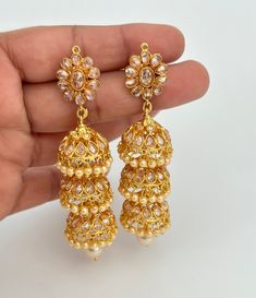 Gold Plated Polki Jhumka/Polki stone Jhumka/Indian Jewelry/Pakistani/Punjabi/Indian/Statement earring/Bridal earring/Indian wedding Double Jhumki length 2.4 inches, width 0.9 inches Triple Jhumki length 3.1 inches, width 0.9 inches Lightweight and elegant Can be paired with any dress Closure: Pushback This is 100% Handmade jewelry. So Color, shades, texture displayed may slightly vary from the actual product due to digital image limitations. We request you to consider these minor variations. Ple Luxury Round Bollywood Jhumkas, Luxury Temple Jewelry Chandbali Jhumkas, Luxury Yellow Gold Fusion Jhumkas, Luxury 22k Gold Bollywood Bridal Earrings, Luxury Bollywood Multicolor Jhumkas, Jumkis Indian Jewelry Gold, Polki Jhumkas, Earring Indian, Earring Bridal