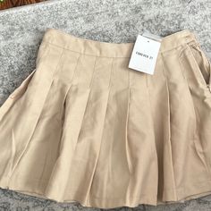 Brand New, Khaki Pleated Skirt. Size Is 9/10 But It Runs Small, I’d Say Fits Like A Size 8 Trendy Pleated Mini Skirt For School, Trendy Flared Mini Skirt For School, Preppy Pleated Mini Skirt For School, Trendy Flared Skirt For School, Trendy Flared School Skirt, Trendy Pleated School Skirt, Casual Flared Pleated Skirt For School, Casual Pleated Skirt For School, Casual Flared Pleated School Skirt