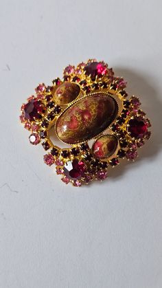 Please inspect photos for condition. Any questions please ask. All items are vintage or Antique and may have slight defects. Postage within 2 days of payment. Thank you for checking out my listing 😊 Vintage Red Brooches For Formal Occasions, Vintage Red Brooches For Party, Red Retro Brooch Jewelry, Retro Red Brooch Jewelry, Vintage Red Wedding Brooches, Vintage Type, Easter Egg, Favorite Things Gift, Pink Red