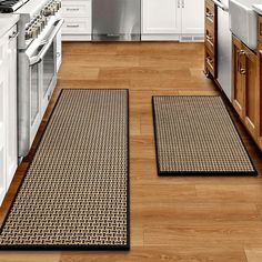 two mats on the floor in a kitchen