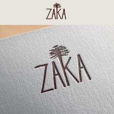 the logo for zaka is shown on top of a piece of paper with an image of a tree