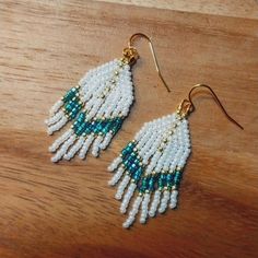 Handmade Beaded Minimalist Earrings, Turquoise, White & Gold Beaded 1.5 Inch Bundle And Save Open To Reasonable Offers Package & Shipped W/ Care! Please Refer To Pictures For Details Before Purchase Color May Appear Slightly Different From Photos Due To Lighting Reach Out If Any Questions Short Beaded Earrings, Earrings Patterns, Beaded Fringe Earrings, Beaded Earrings Patterns, Earrings Turquoise, Beaded Fringe, Earring Patterns, Fringe Earrings, Minimalist Earrings