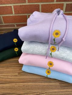 machine embroidered hoodie featuring a cute little sunflower 🌻 embroidered onto a gildan hoodie, composed of 50% cotton and 50% polyester sizing as follows Sizes: S (50,8cm-68,6cm) / M (55,9cm-71,1cm) / L (61cm-73,7cm) / XL (66cm-76,2cm) / XXL ( 71,1cm-78,7cm) these are made to order and i may need to order your preferred size & colour, so please allow time for your hoodie to be ready!  if you have any questions or would like a colour that isn't listed etc, please message me! ☺️ Sunflower Hoodie, Gildan Hoodie, White Bear, Yellow Sunflower, Bear Stuffed Animal, Embroidered Hoodie, Cat Gifts, Gifts Photos, Beanie Hats