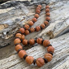 "Lovely vintage beaded coral necklace. measure approximately: 19 1/2\" long and 13mm coral beads condition: vintage X178" Artisan Single Strand Orange Beaded Necklace, Rustic Large Beads For Gifts, Handmade Vintage Beaded Necklaces For Meditation, Orange Single Strand Spiritual Necklace, Orange Red Coral Beaded Necklaces With Large Beads, Orange Single Strand Beaded Necklace With Round Beads, Orange Beaded Necklace With Large Red Coral Beads, Orange Red Coral Beaded Necklace With Large Beads, Coral Necklace With Single Strand Round Beads