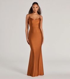 Made to celebrate enchanting evenings, the Virginia mermaid formal dress is a stunning option for bridesmaids, wedding guests, or attending soirees! The cowl neckline and spaghetti straps add a touch of elegance, while the open tie-back design allows for a sultry reveal. The mermaid silhouette and floor-length hem create a flattering and sophisticated look. Style this formal dress with dainty earrings and heels.Fit & FeaturesSleek knit fabric, moderate stretchCowl necklineSpaghetti strapsOpen tie-back designMermaid silhouetteSticky bra or pasties recommendedRuns true to size Elegant Mermaid Dress With Fitted Bodice For Gala, Fitted Mermaid Dress With Sweep Train For Bridesmaids, Fitted Mermaid Bridesmaid Dress With Sweep Train, Elegant Gown With Fitted Bodice And Mermaid Hem, Formal Mermaid Dress With Sweep Train, Fitted Bridesmaid Mermaid Dress With Sweep Train, Elegant Mermaid Dress With Fitted Bodice For Prom, Formal Mermaid Evening Dress With Sweep Train, Fitted Mermaid Hem Bridesmaid Gown