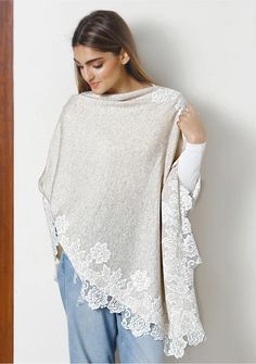 Petite Oatmeal Mélange Knitted Wool Poncho with Ivory Chantilly Lace | Maneesha Ruia Beige Poncho For Layering, One Size Beige Poncho For Layering, Elegant Beige Cape Poncho, Elegant Beige One Size Poncho, Elegant One Size Beige Poncho, Beige Knit Poncho One Size, Beige Knit Poncho, One-size Beige Knit Poncho, White Poncho For Layering