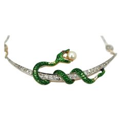 This Antique Diamond Crescent Necklace with Snake holding a pearl is on a diamond studded chain. This snake started his life as a pin/brooch but I turned it into a necklace. There is slight loss to the green enamel but it does not distract from the beauty of this piece. Once a brooch turned into a necklace this will get others asking questions such as "where did you get that", awesome piece and unique. I originally had this made for myself, but now with so many snake pieces in my collection some Snake Holding, Gold Filigree Necklace, Victorian Pendant Necklace, Chain Art, Serpent Jewelry, Gold Locket Necklace, Expensive Jewelry Luxury, Crescent Necklace, Pearl Chain Necklace