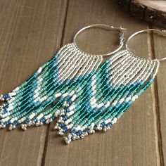 Beaded Bohemian Chandelier Earrings, Unique Beaded Hoop Jewelry, Bohemian Beaded Chandelier Earrings, Adjustable Beaded Dangle Hoop Earrings, Adjustable Hoop Jewelry With Dangling Beads, Turquoise Beaded Dangle Jewelry, Trendy Beaded Silver Jewelry, Trendy Handmade Summer Jewelry, Beaded Bohemian Drop Earrings