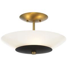 an overhead view of a ceiling light with two lights on each side and one light in the middle