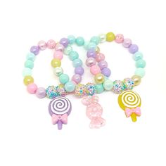 These adorable bracelets are the perfect favor for your little one's macaroon themed party! Each bracelet features a pastel resin macaroon charm, resin rhinestone beads and an assortment of pastel 10mm acrylic beads strung with durable stretch floss cord. You will receive a mix of charm colors. Each bracelet will arrive individually packaged in organza bags. Please select the number of bracelets and bracelet size needed from the drop down menu. Please message me if you have any questions. These Sweet Beaded Bracelets For Birthday, Sweet Round Beaded Bracelets For Birthday, Sweet Beaded Bracelets With Round Beads For Birthday, Sweet Multicolor Party Jewelry, Playful Pink Charm Bracelet For Birthday, Adjustable Sweet Jewelry For Party, Sweet Beaded Jewelry For Birthday, Trendy Plastic Jewelry For Birthdays, Sweet Pink Hypoallergenic Jewelry