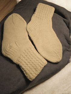 Keep your little one's feet toasty and comfortable this winter with our hand-knitted white socks. Made from a thoughtful blend of 30% wool and 70% acrylic, these socks combine the warmth of wool with the durability of acrylic, ensuring they can withstand playful days and peaceful nights alike. Key Features     Material Blend: Crafted with 30% wool for warmth and 70% acrylic for enhanced durability and ease of care.     Color: Classic white, perfect for matching with any outfit.     Size: Designe Winter Footwear, White Socks, Wool Knit, Kids Socks, White Sock, Casual Socks, Winter Shoes, Socks And Hosiery, Childrens Shoes