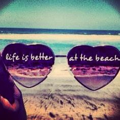 two heart shaped sunglasses with the words life is better at the beach