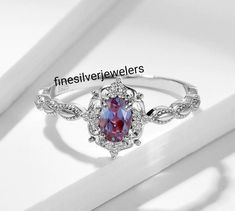 Silver Oval Crystal Ring With Halo Design, Alexandrite Ring Silver, Alwxandrite Engagment Ring White Gold Band, Alexandrite White Gold Ring, Silver Alexandrite Rings, Synthetic Alexandrite Engagement Ring, Onyx Engagement Ring, Sterling Silver Wedding Rings, Alexandrite Ring