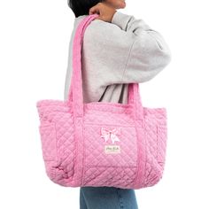 Our Candy Tote Bag is a cozy and stylish bag that combines every-day convenience with a classic design. It features 3 exterior pockets, and a bow for an added touch of elegance.   The quilted pink terry exterior is thick and luxurious, complemented by the matching pink gingham interior.   Ideal for carrying books and groceries, or hauling beach gear and gym clothes, this bag is a must have for anyone who values versatility.   Size: 16.5" x 12" x 5" (42cm x 30cm x 12cm) Gingham Interior, Mini Makeup Bag, Inside My Bag, Large Makeup Bag, Gym Tote, Animal Bag, Vanity Bag, Beach Gear, Crossbody Tote Bag