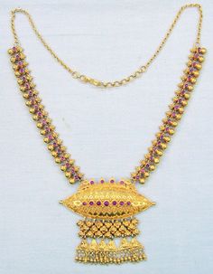 "Vintage 22 karat solid gold spiky design necklace(champakalee har) from rajasthan india. made of solid 22 karat gold and sated ruby color stones. full handcrafted great piece for your jewelry collection. buyer will get gold test report for this item for free. total weight of necklace-58.500 grams(2.04 ounce), total length of necklace-20\"(we can adjust length), material -solid 22 karat gold." Ornate 22k Gold Jewelry For Puja, Gold Plated Necklaces For Festivals, Temple Jewelry Style Yellow Gold Necklace With Latkans, Temple Jewelry Yellow Gold Necklace With Latkans, Yellow Gold Temple Jewelry Necklace With Latkans, Handmade Gold-plated Temple Necklace, Handmade Gold Plated Temple Necklace, Ornate Gold Necklaces For Puja, Ornate 22k Gold Ceremonial Necklace