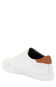 A contrast-color heel and welt bring sleek definition to the contours of this leather sneaker featuring a debossed logo on the heel. Leather upper and lining/rubber sole Imported Debossed Logo, Sneaker Men, Leather Sneakers, Low Top, Contrasting Colors, Nordstrom Rack, Top Sneakers, Rubber Sole, Leather Upper