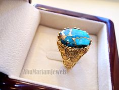 Gold Oval Hallmarked Turquoise Ring, Gold Turquoise Oval Cabochon Ring, Gold Turquoise Cabochon Ring In 14k Gold, Luxury Gold Turquoise Ring, Luxury Gold Turquoise Ring As Gift, Luxury Gold Turquoise Ring For Gift, Luxury Gold Turquoise Ring Perfect For Gift, Gold Turquoise Ring With Oval Cabochon, Gold Men Ring