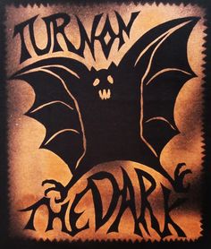 an image of a bat with the words turnay and dark on it's back