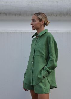 Introducing our hottest summer linen shirt in Earthy Green (shorts and pants available in the same color). This shirt offers a classic yet relaxed look, and its color will catch everyone's attention, making you stand out from the crowd. The oversized style features dropped shoulders, just like other shirts in our collection. Made from softened linen, we guarantee no itchiness! Grab yours and feel your most fabulous! DETAILS:  - Oversized Fit - Dropped Shoulders - Long Sleeves  - Button-down shirt  - Sea Shell Buttons - 100% lightweight softened European linen fabric - Hand-Made in our small studio in Siauliai, Lithuania SIZE IN THE PICTURE: The model is wearing size S. The Model's height is 5'5"/ 165cm. SIZE GUIDE:  *Please note that this chart indicates garment size, not body size. XS (US Green Linen Tops For Loungewear, Green Linen Loungewear Tops, Green Blouse With Pockets For Summer, Green Relaxed Fit Blouse With Pockets, Relaxed Fit Green Blouse With Pockets, Green Summer Tops With Pockets, Green Casual Shirt For Summer, Green Linen Blouse For Vacation, Summer Green Shirt For Daywear