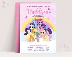 a pink birthday card with little ponys on it