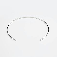 Handmade solid sterling silver choker necklace. Round, open design, polished finish. Perfect for stacking or as a minimalist statement.Diameter: 115 mmOpening width: 55 mmWire width: 2 mmVisit my shop: http://www.etsy.com/shop/jewelryMirta© MIRTA Simple Silver Choker Jewelry, Modern Sterling Silver Choker Necklace, Minimalist Polished Sterling Silver Bracelet, Modern Sterling Silver Choker For Gift, Modern Polished Choker Jewelry, Sterling Silver Choker In Silver, Modern Silver Choker Jewelry, Silver Sterling Silver Choker, Modern Sterling Silver Choker As Gift