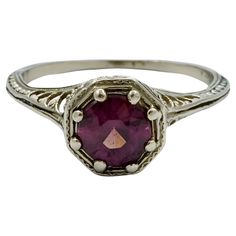 Art Deco 14K white gold dress ring with a faceted amethyst in an ornate filigree setting. Ring size UK M / US 6, inside diameter 1.75 cm / .68 inch, and the setting depth is 5.5 mm / .2 inch. The ring is in very good condition. This is a beautiful and stylish white gold and amethyst ring, circa 1930s. A classic from the Art Deco era. White Gold Dress, Dress Ring, Dress Rings, Art Deco Era, Gold Dress, Amethyst Ring, Fashion Rings, Jewelry Box, Jewelry Rings