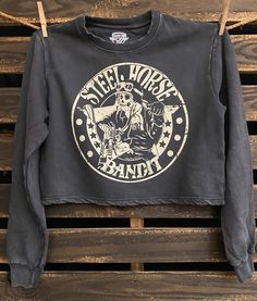 Country Deep Steel Horse Bandit Cropped crew neck sweatshirt in Acid wash black Acid Wash6.5 oz, 32 single52% Airlume combed and ring-spun cotton/48%Side-seamedRaw hemCropped BodyRibbed cuffsSizes: S-XL Distressed Cotton Sweatshirt, Distressed Long Sleeve Cotton Sweatshirt, Distressed Cotton Long Sleeve Sweatshirt, Distressed Crew Neck Winter Top, Distressed Crew Neck Tops For Winter, Winter Crew Neck Distressed Tops, Black Washed Crew Neck Top, Black Washed Crew Top, Distressed Crew Neck Sweater For Streetwear