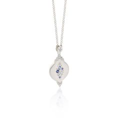 Evocative of falling raindrops, this pendant features a lovely array of blue sapphires and aquamarines with diamond accents. Set in sterling silver to accentuate the cool tones of the stones. Sterling Silver Blue Sapphire Aquamarine Diamond 16-18" Adjustable Sterling Silver Chain Satin Finish Style sc506-3 Blue Pendant Necklaces With Rose Cut Diamonds, Blue Rose Cut Diamond Pendant Necklace, Blue Rose Cut Diamond Pendant Jewelry, Silver Sapphire Necklace With Single Cut Diamonds, Blue Rose Cut Diamond Necklaces For Weddings, Blue Rose Cut Diamond Necklace For Weddings, Blue Rose Cut Diamond Wedding Necklace, Blue Sapphire Pendant Diamond Necklace, Silver Sapphire Pendant Diamond Necklace