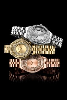 This luxe gold-tone bracelet watch is embellished with sparkling stones.- Style #: J6381A- Series: Bellini- Style: Bracelet- Gender: Women's- Case Material: Gold-tone stainless steel- Dial Color: Gold-tone- Hands: Gold-tone- Markers: Gold-tone indexes- Bracelet Material: Gold-tone stainless steel- Closure: Foldover clasp- Crystal: Mineral- Bezel: Embellished- Case Diameter: 30mm- Diamonds: 0.12ctw- Movement: Highest standard Japanese Multi-Function Movement- Water Resistance: 90ft/30M- Battery- Metal Diamond Watch With Diamond Hour Markers, Gold Stainless Steel Diamond Watch With Diamond Hour Markers, Gold Diamond Watch With Stainless Steel, Formal Watches With Rhinestones, Gold Cubic Zirconia Watches For Anniversary, Gold Diamond Watch With Rhinestones, Gold Round Watch With Rhinestones, Gold Round Watches With Rhinestones, Gold Watches With Rhinestones