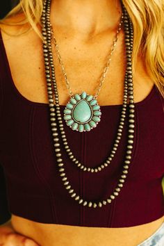 Make a statement with the Layered Silver Pearl and Chain Turquoise Cluster Necklace. Featuring a combination of faux Silver pearl, chain and turquoise clusters, this piece has it all - what a statement! Turquoise Necklace Outfit, Necklace Outfit, Simple Black Dress, Cluster Necklace, Western Jewelry, Straight Leg Denim, Pearl Chain, Cute Fits, Silver Pearls