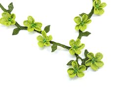 Add an illuminating touch to any look with our bold Primrose Necklace featuring a vibrant and stunning floral detail embellished with beads. Beaded Flower Necklace For Spring, Elegant Green Flower Necklace, Elegant Green Beaded Flower Necklace, Elegant Green Necklace For Spring, Spring Party Green Necklaces, Pistachio Green, Shop Earrings, Necklaces Bracelets, Pure Products