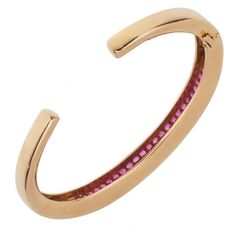 For Sale on 1stdibs - A fabulous Van Cleef & Arpels bracelet circa 1980, this luxurious bracelet features 3 rows of vivid pink sapphires set in shimmering 18k rose gold.