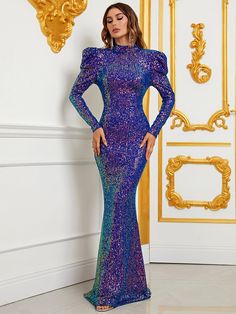 Product Code: FSWD0980 Embellishment: Sequin Fabric: 100% Polyester Back Style: Zipper Up Fully Lined: Yes Built-in Bra: No Available Color: Purple Stretch: Moderate Fits true to size Imported Model Information: Height: 5' 2" Bust: 33.5'' Waist: 24“ Hips: 35.5” wearing US size Small Fitted Mermaid Evening Dress With Sequins, Purple Fishtail Evening Dress, Evening Fishtail Purple Dress, Fitted Mermaid Gown With Sequins, Purple Mermaid Dress For Formal Occasion, Purple Fitted Long Sleeve Gown, Formal Purple Mermaid Fishtail Dress, Purple Fishtail Mermaid Dress For Formal Occasions, Formal Purple Fishtail Mermaid Dress