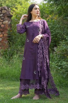 Purple straight kurta with sequin embroidered floral motifs. Comes with inner, pant and sheer dupatta.
Component: 4
Embroidery
Neckine: Kurta: Round
Sleeve Length: Kurta: Three fourth
Fabric: Silk Chanderi, Cotton, Organza
Color: Purple
Floral embroidered scallop border on dupatta
Floral embroidered scallop hem on pant
Floral embroidered scallop hem on inner - Aza Fashions Sheer Dupatta, Asymmetric Tunic, Chanderi Kurta, Drape Pants, Pant Set For Women, Scallop Hem, Straight Kurta, Purple Silk, Silk Embroidery