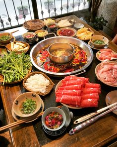 a table filled with lots of different types of food