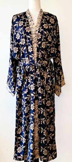 Luxury Silk Kimono Duster: Elegant. This Kimono has a beautiful finish, printed on a classic patern. Creates depth, interest, and designer appeal. Luxurious fabric, soft, opaque. The perfect duster for cocktail parties, resort, beach or poolside cover-up. Adapts well to a duster coat or dress. A stunning mix of rich navy and cream. Great gift for Valentine's Day, Mother's Day, Birthday, or just because you deserve it. Fabric is soft and drapes perfectly. Designed as a duster kimono with multiple style options. Wear open and flowing over a pantsuit, slip dress (looks incredible), belted as a cocktail dress. Material is opaque, pliable and holds it's shape. Definite designer look, elegant. You decide on the styling. Great for travel. Perfect for parties, summer, and at-home entertaining. Mat Duster Kimono, Duster Dress, Beach Kimono, Resort Beach, Kimono Duster, Cocktail Parties, Print Kimonos, Long Kimono, Luxury Silk