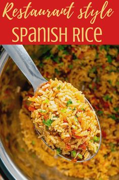 a spoon full of spanish rice with the words restaurant style spanish rice