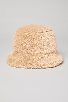 The iconic bucket hat just got a Sherpa update! Top off your cool-weather look with this plush Sherpa bucket hat, featuring a full, textured brim. Plush sherpa (faux fur) Center front woven patch Alo logo Casual Brimmed Hat With Plush Lining, Casual Brimmed Hat With Faux Fur Lining, Brown Flat Brim Bucket Hat For Winter, Beige Curved Brim Bucket Hat For Winter, Winter Outdoor Beige Bucket Hat, Reversible Brimmed Bucket Hat For Winter, Sherpa Bucket Hat, Sitewide Sale, Holiday Colors